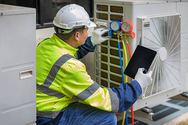 Professional Hvac technician working in Hartsville, IN